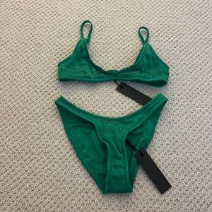 Triangl bikini! NWT/never worn. Size small top & bottoms Full coverage bottoms!